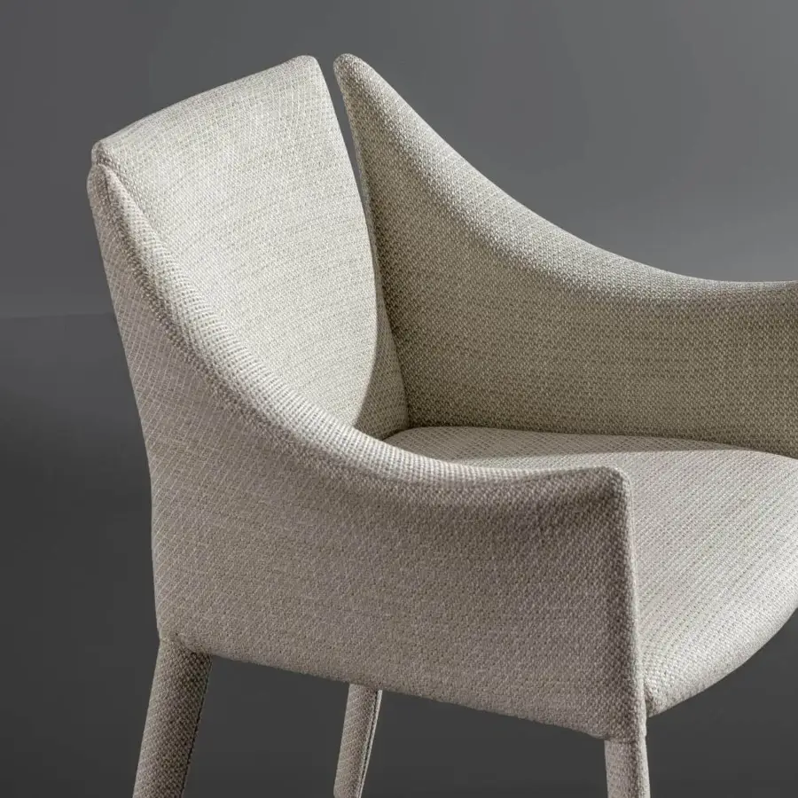 Captivating Bonaldo Vela armchair in light beige fabric with a steel structure and segmented backrest