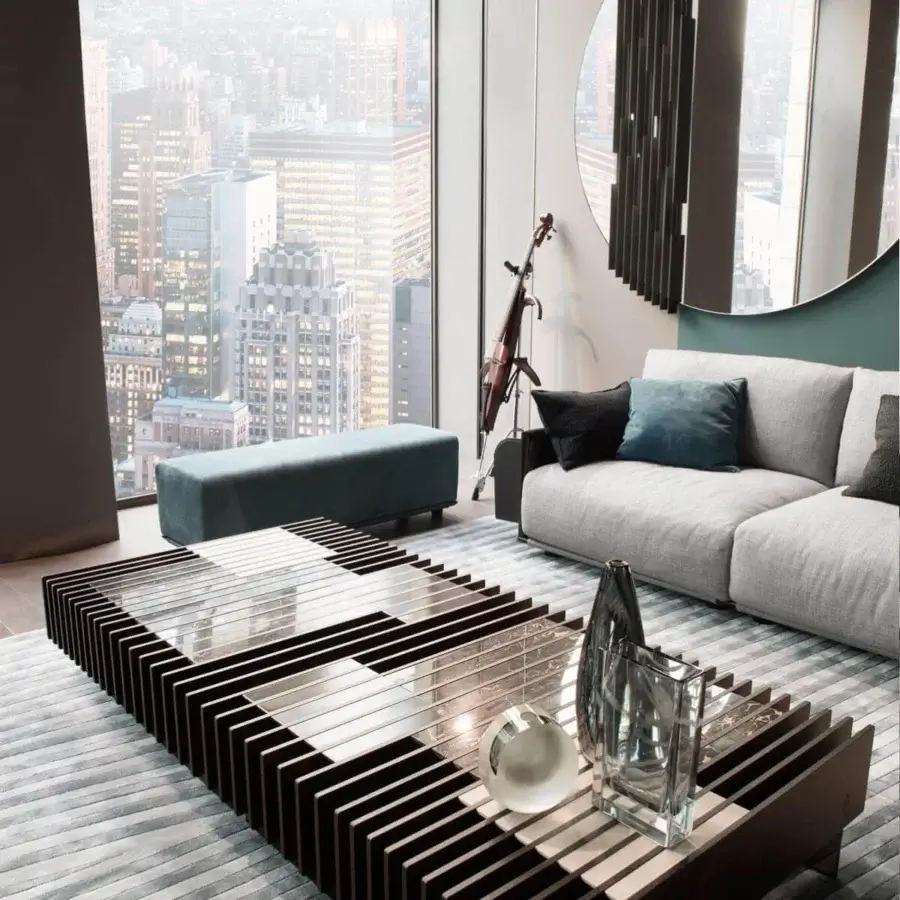 Superior Giorgetti Adam sectional with pewter painted metal, light gray woven textile and goose down pillows in darker gray and blue hues