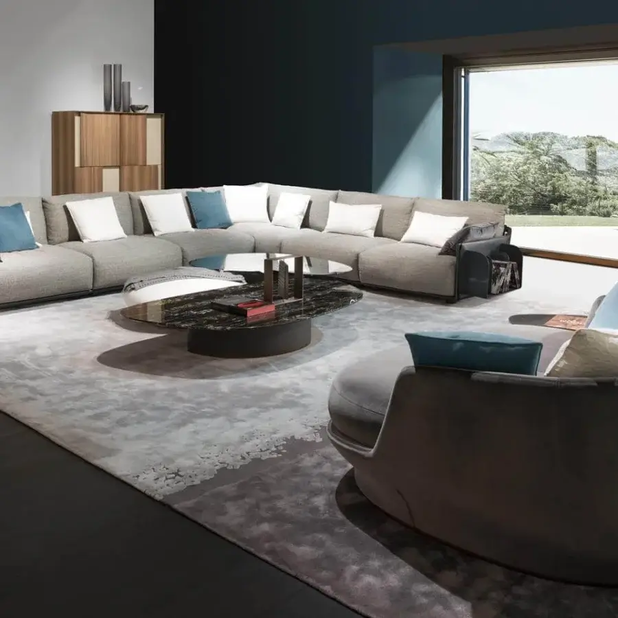 Superior Giorgetti Adam sectional with light gray fabric, pewter painted metal and plush goose down cushions