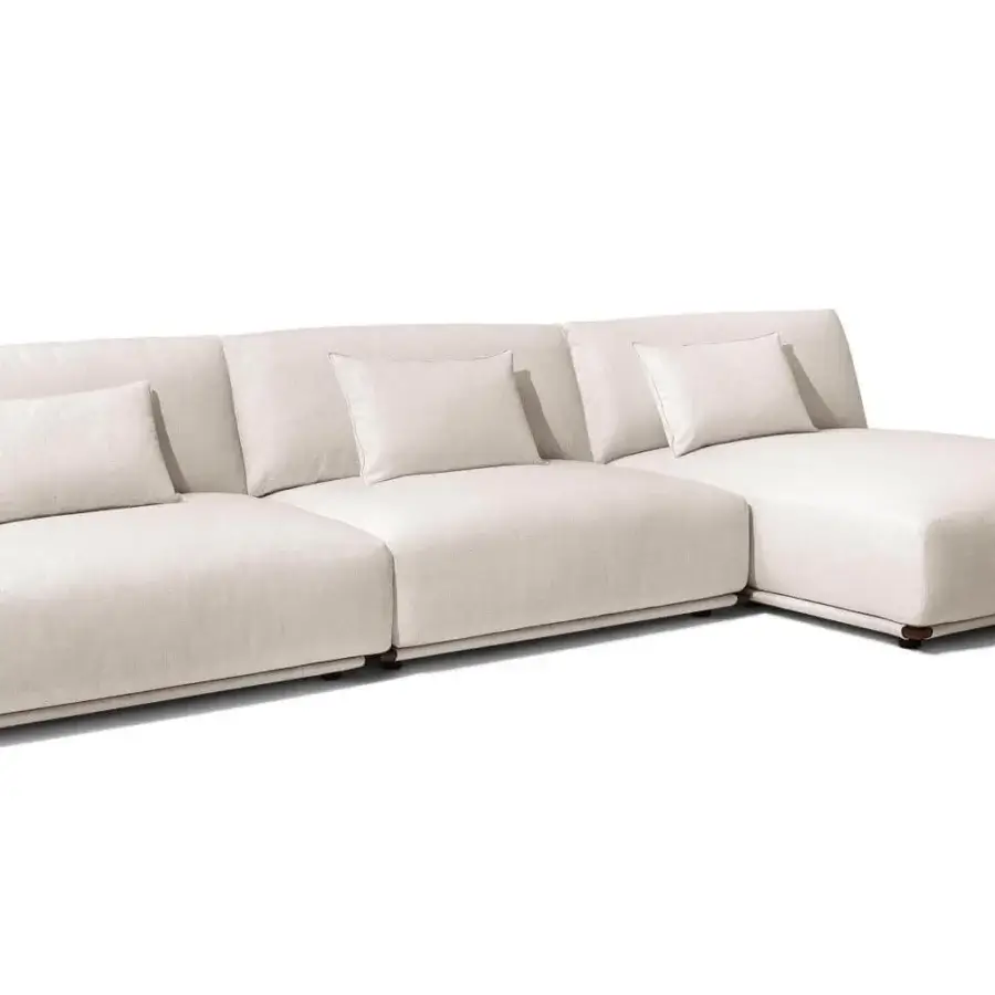 Lavish Giorgetti Adam sectional with light fabric covers, darker saddle leather details and pewter painted metal structure