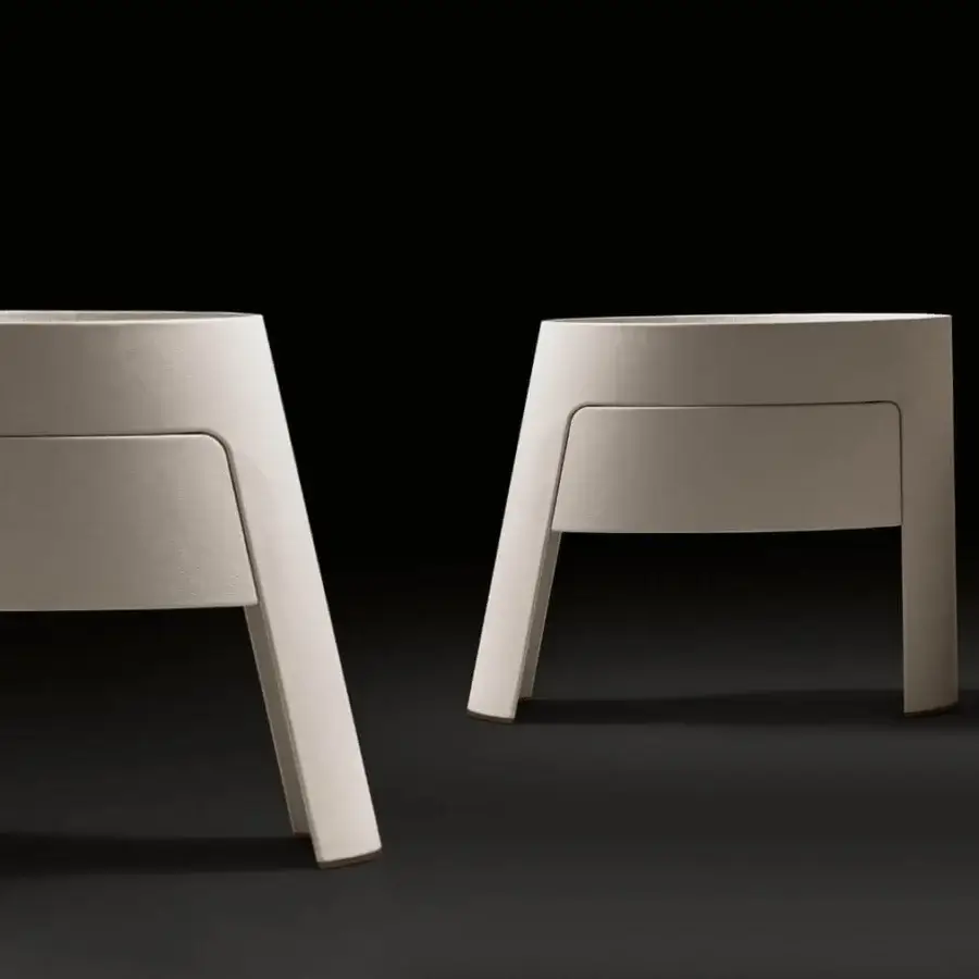 Superior Giorgetti Morfeo nightstand in light beige synthetic material with matte finish presents a rounded rectangular form