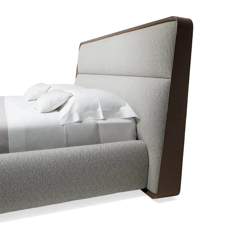 Exceptional Giorgetti Frame bed in light gray textured textile with dark brown saddle leather trim and upholstered base