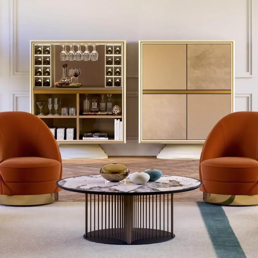 Distinguished Vismara Capsule lounge chair with plush burnt orange textile and glossy gold rotating steel base