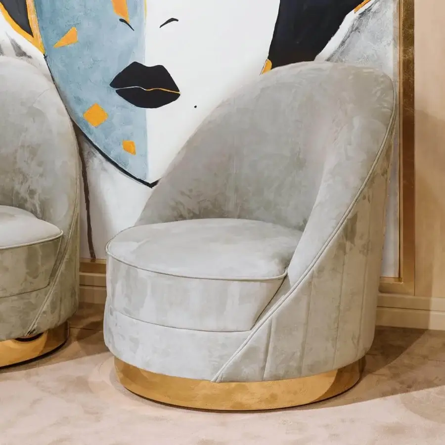 Lavish Vismara Capsule lounge chair in soft gray or sage textile with rotating gold-colored steel base