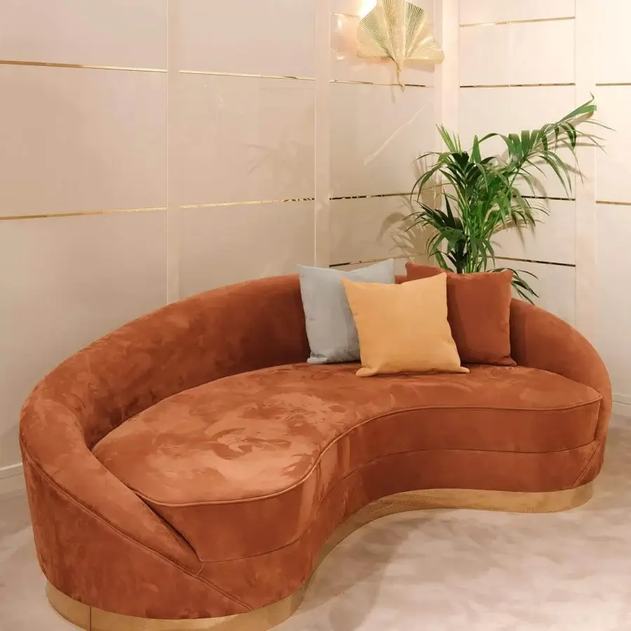 Captivating Vismara Wavy sofa with sinuous silhouette upholstered in earthy brown textile and plated golden steel base