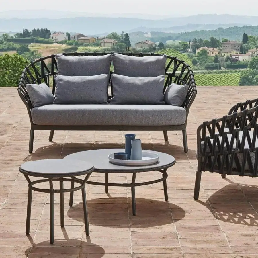 Distinguished Varaschin Emma Cross coffee table with flared shape in matte gray hpl and powder-coated aluminum structure
