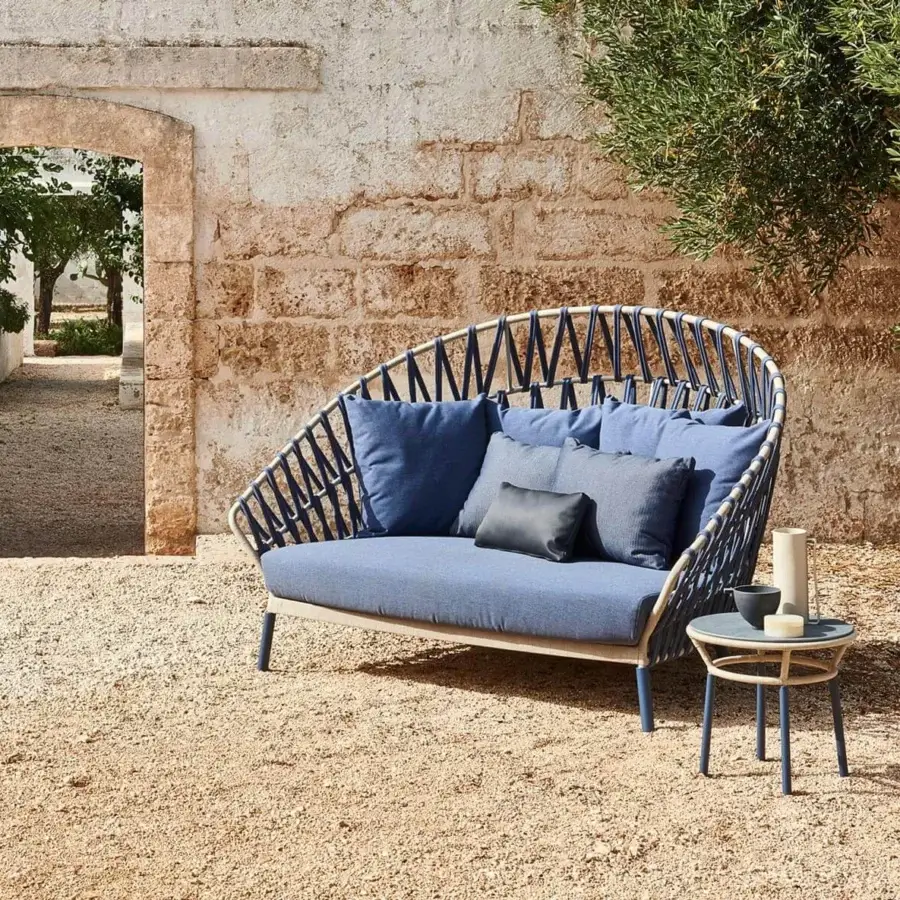 Refined Varaschin Emma Cross side table with muted blue HPL top and powder-coated aluminum frame dressed in synthetic fiber rope