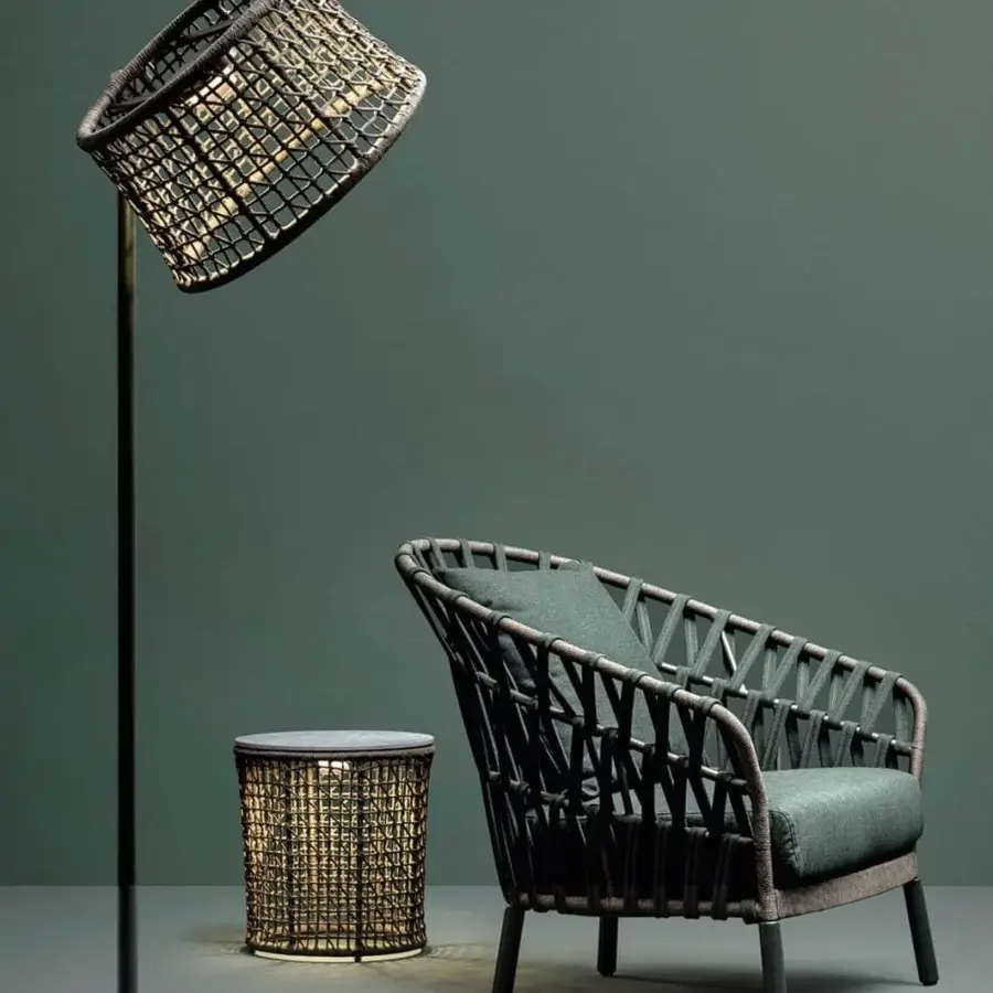Superior Varaschin Emma Cross lounge chair with woven acrylic fabric and dark green textile upholstery, built with powder-coated aluminum framing
