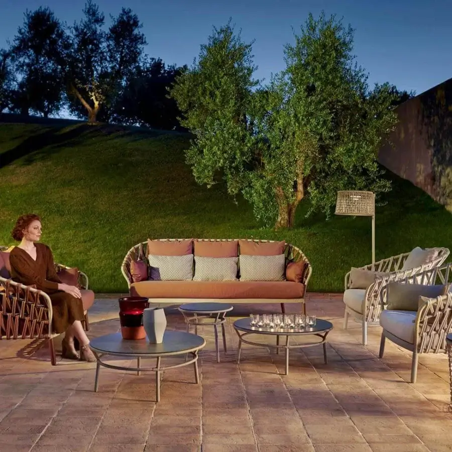 Distinguished Varaschin Emma Cross sofa with light brown hand-woven acrylic fabric and enveloping powder-coated aluminum frame