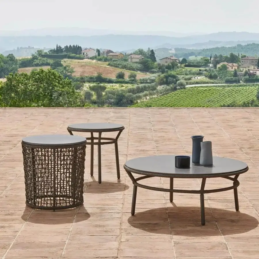 Distinguished Varaschin Emma side table with bush-hammered ceramic top and powder-coated aluminum frame crafted in dark brown matte finish