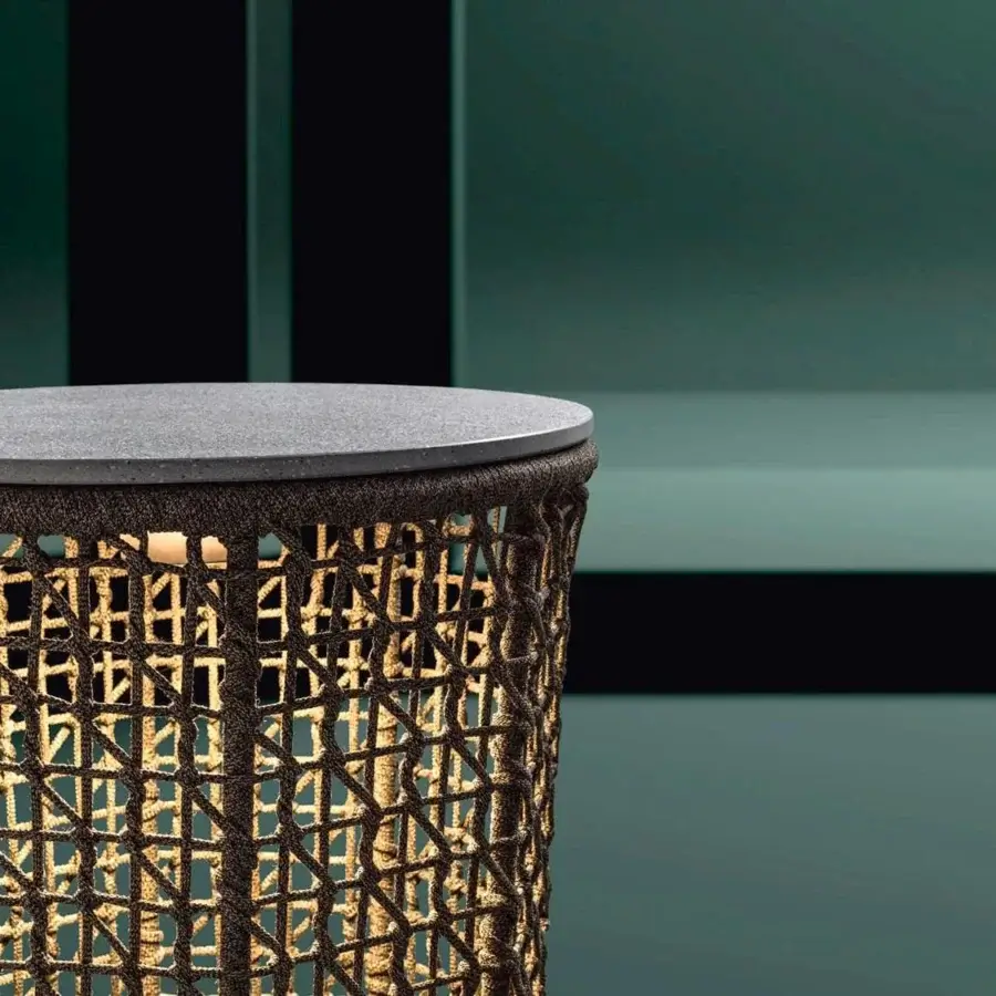Distinguished Varaschin Emma side table with bush-hammered ceramic top and dark brown woven powder-coated aluminum frame