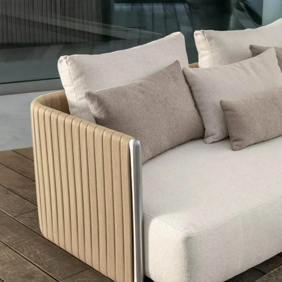 Exceptional Talenti George sofa with a stainless steel structure covered in padded rope weave and light beige textile cushions