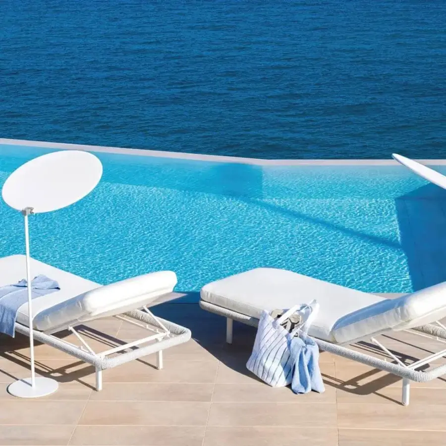 Elegant Varaschin Emma sunshade with white micro-perforated technical PVC shade and matte white metal pole