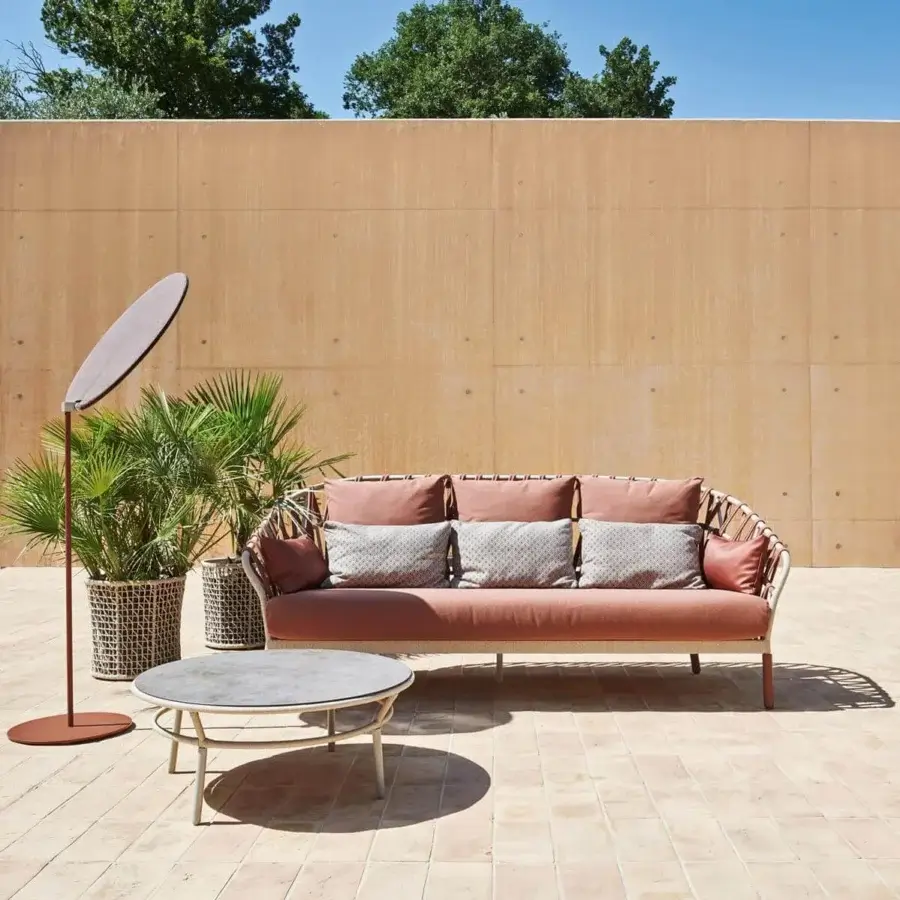 Distinguished Varaschin Emma sunshade with reddish-brown metal support and light beige micro-perforated technical PVC fabric