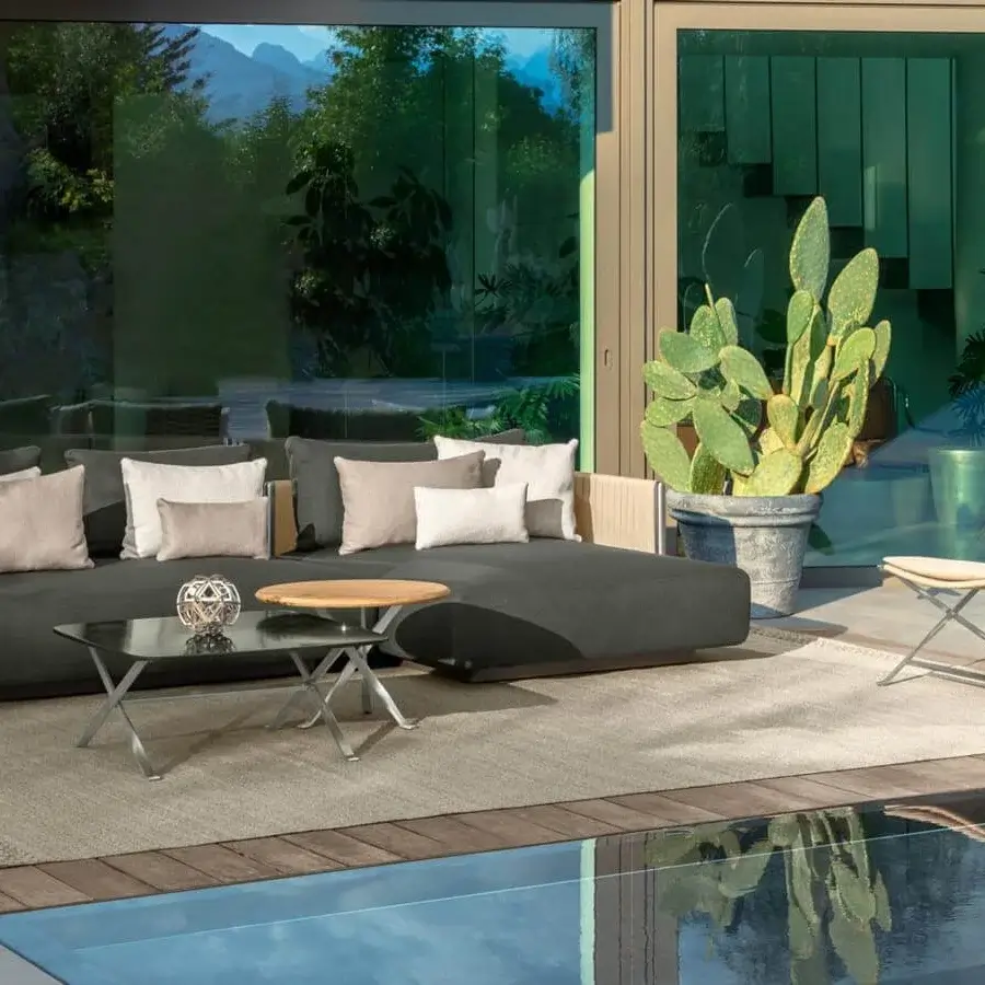 Distinguished Talenti George sectional with dark grey synthetic rope and plush beige weather-resistant cushions built on a stainless steel frame