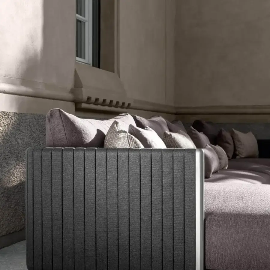 Superior Talenti George sectional with stainless steel framing, muted purple-gray cushions and lightly padded synthetic ropes