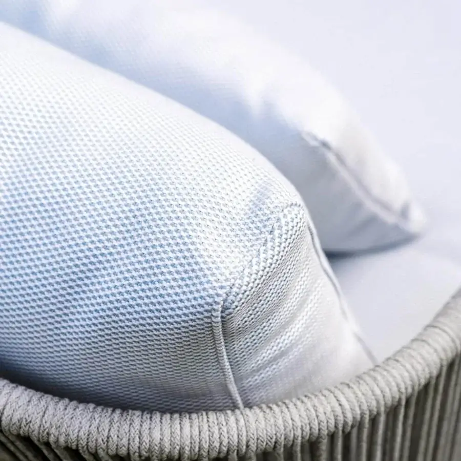 Exceptional Varaschin Cricket sofa with light blue textile cushions within a meticulously hand-woven gray rope shell and light aluminum structure