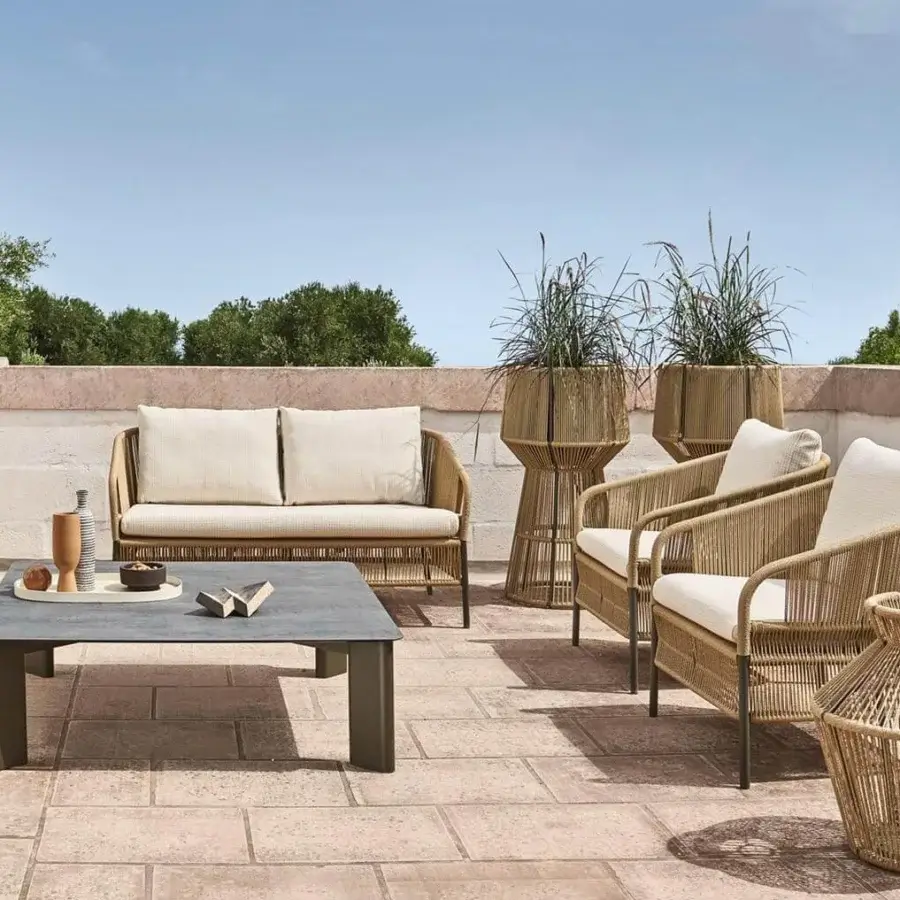 Superior Varaschin Cricket sofa with woven light tan rope and soft light cream cushions built with dark metal legs
