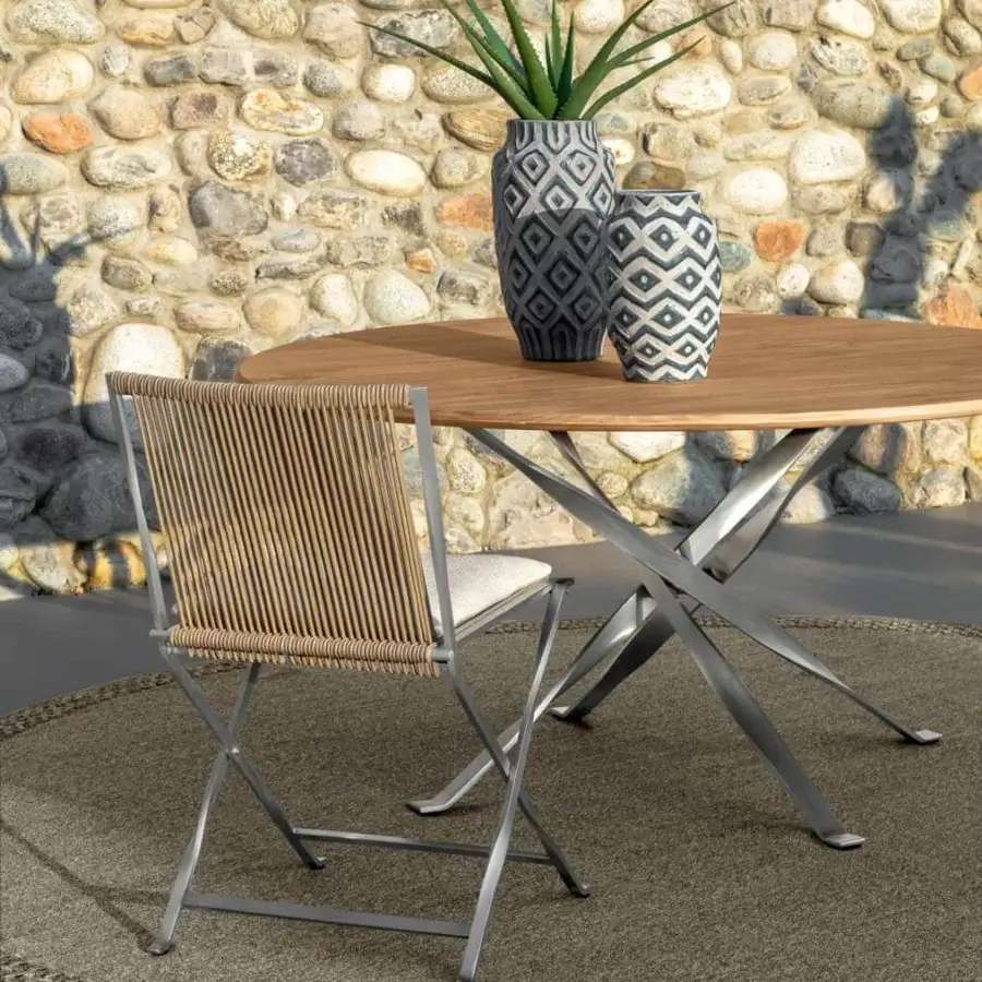 Stylish Talenti George table with large round accoya wood top and stainless steel base in warm brown and matte gray