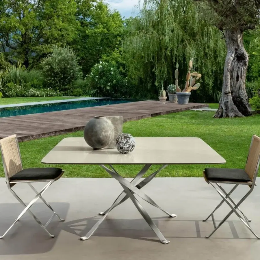Exceptional Talenti George table crafted in light accoya wood with a stainless steel X base and matte finish