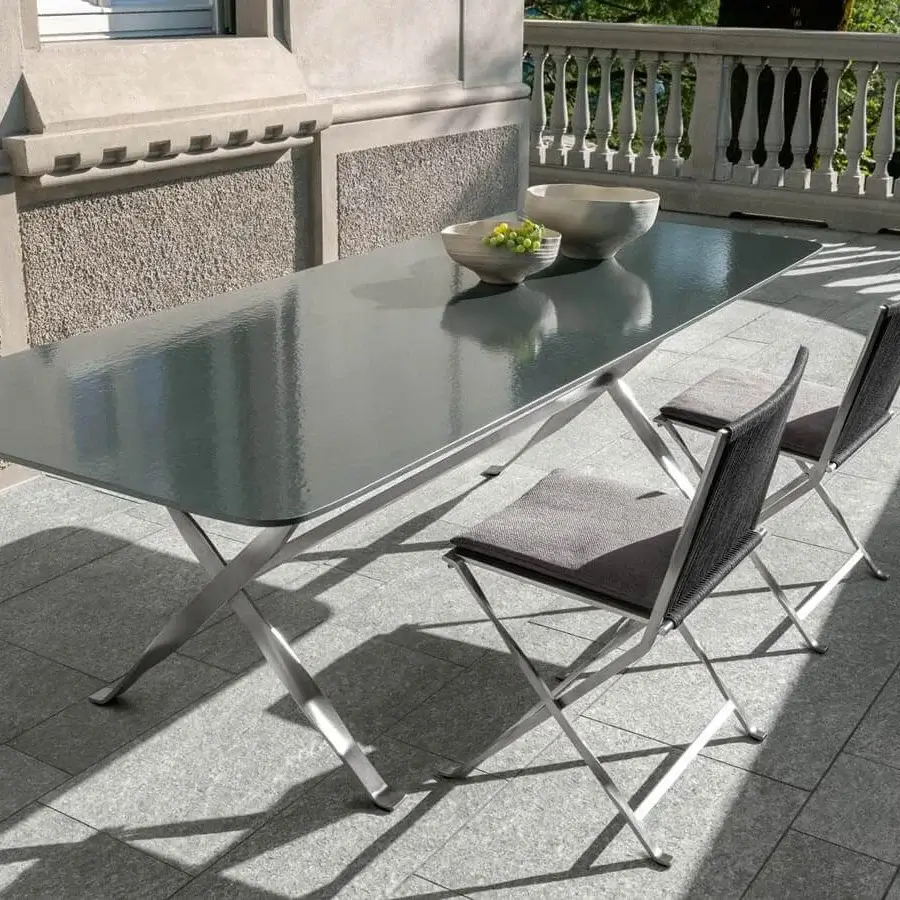 Exclusive Talenti George table with rectangular glossy lava stone top and splendid stainless steel x-shaped base