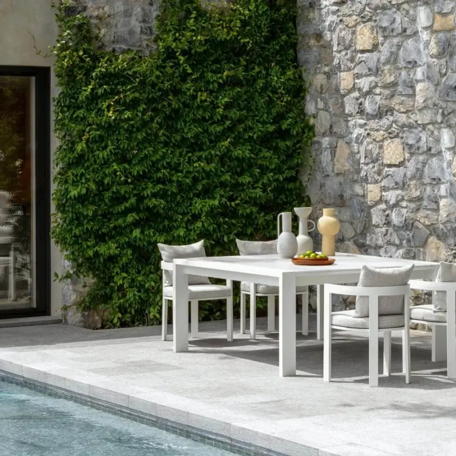 Elegant Talenti Argo Alu table with powder-coated aluminum base and calacatta or grey moon porcelain stoneware top in matte white finish