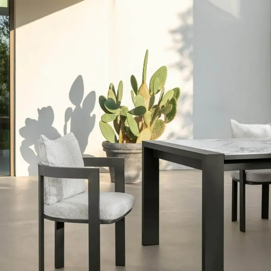 Exceptional Talenti Argo Alu table with a grey moon porcelain stoneware top and dark matte powder-coated aluminum base