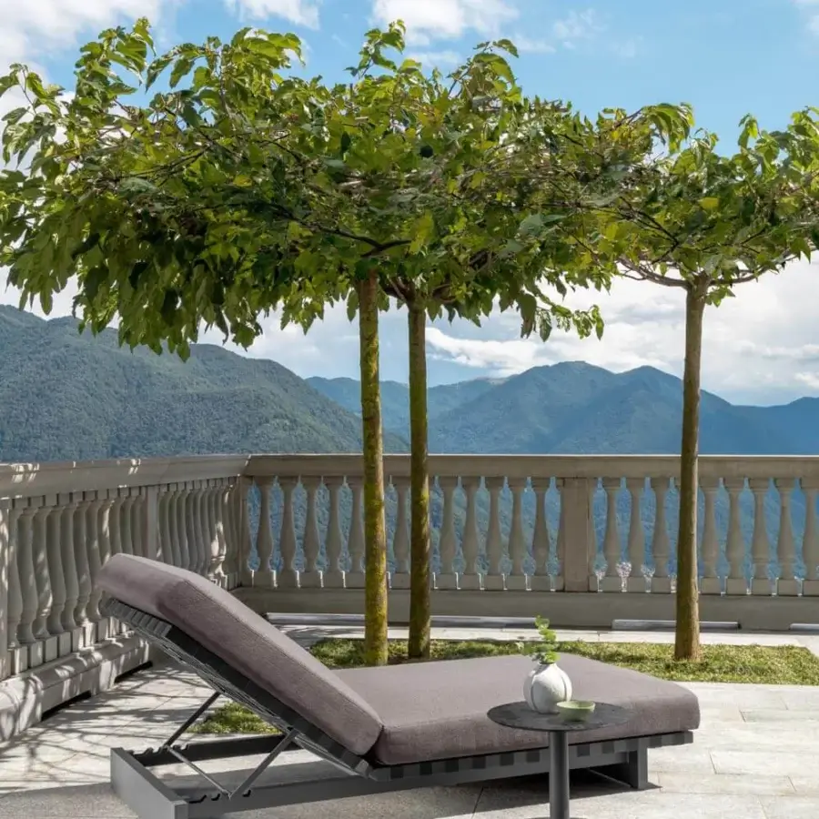 Elegant Talenti Argo Alu lounger with a solid aluminum frame and heathered gray weatherproof cushions crafted with elastic straps