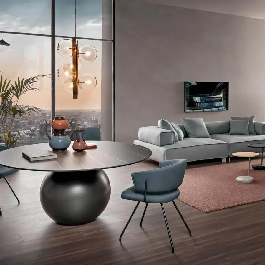 Superior Bonaldo Circus table with dark brown ceramic top and lighter streaks built upon a dark gray metal base