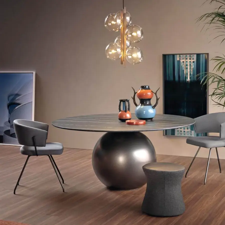 Distinguished Bonaldo Circus table with dark striated ceramic tabletop and satin finish spherical metal base