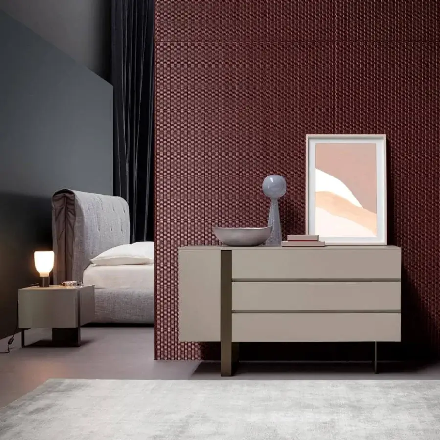 Refined Bonaldo Antibes dresser with light beige lacquered wood and asymmetrical bronze-finished metal base