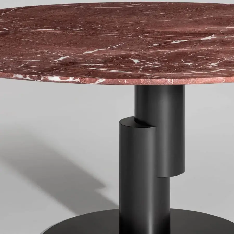 Captivating Bonaldo Innesti table with a reddish-brown marble top and matte black metal cylindrical base crafted in Italy