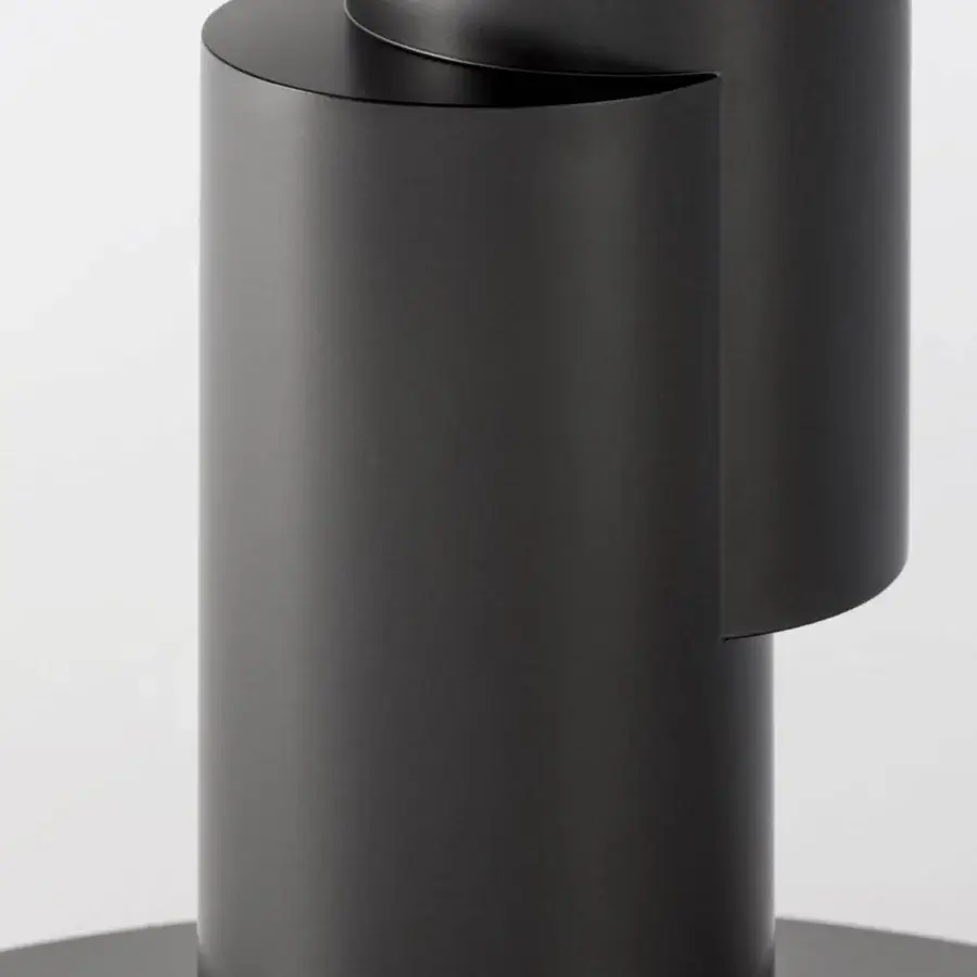 Superior Bonaldo Innesti table with cylindrical forms and matte black finish creating a sculptural effect