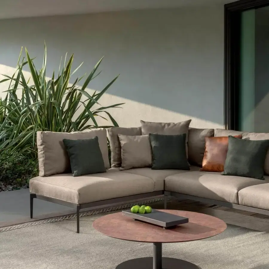 Exceptional Talenti Leaf sectional with light brown textile and dark brown aluminum frame exhibiting a matte finish
