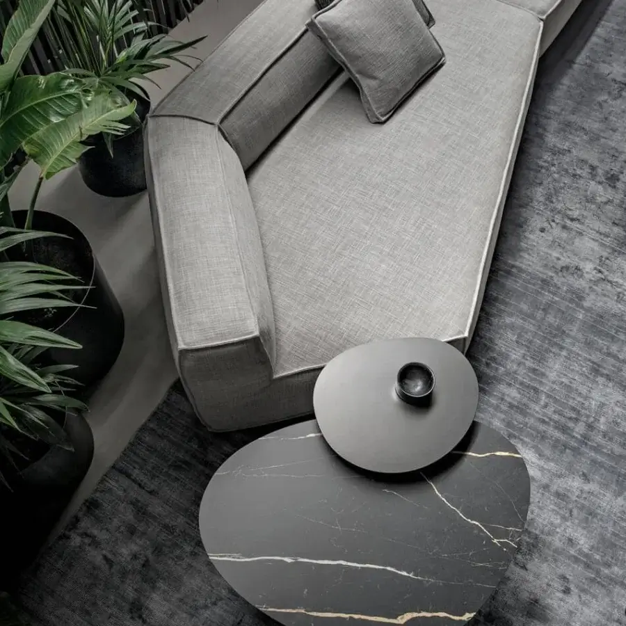 Distinguished Bonaldo Kumo side table crafted in Italy with stone-like material and dark gray elements in matte finish