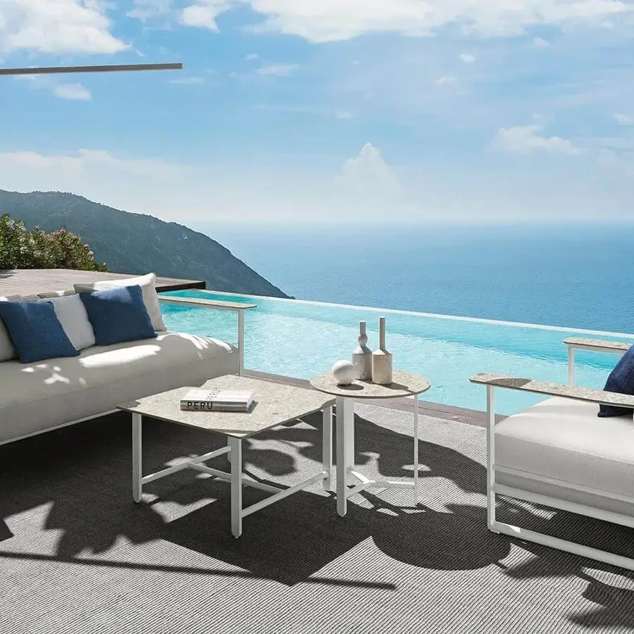 Superior Talenti Riviera coffee table with square light gray stoneware top and linear aluminum base in matte finish