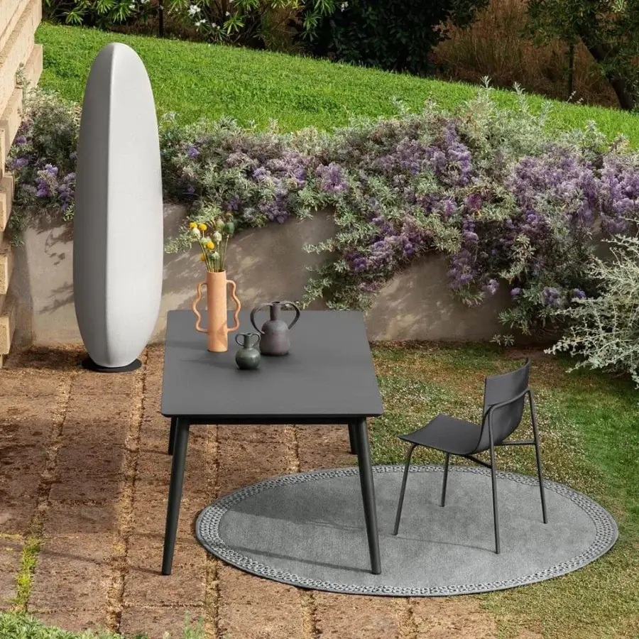 Elegant Talenti Malè chair with wide dark gray polyurethane seat and matte finish steel structure