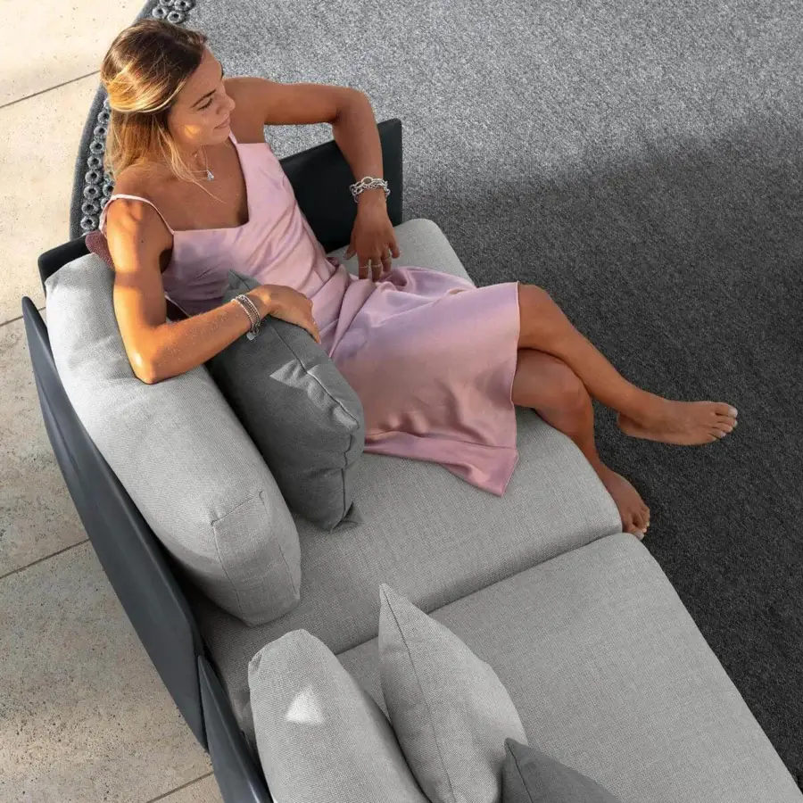 Superior Talenti Malè sectional with light gray weather-resistant cushions and a dark-toned polyethylene frame