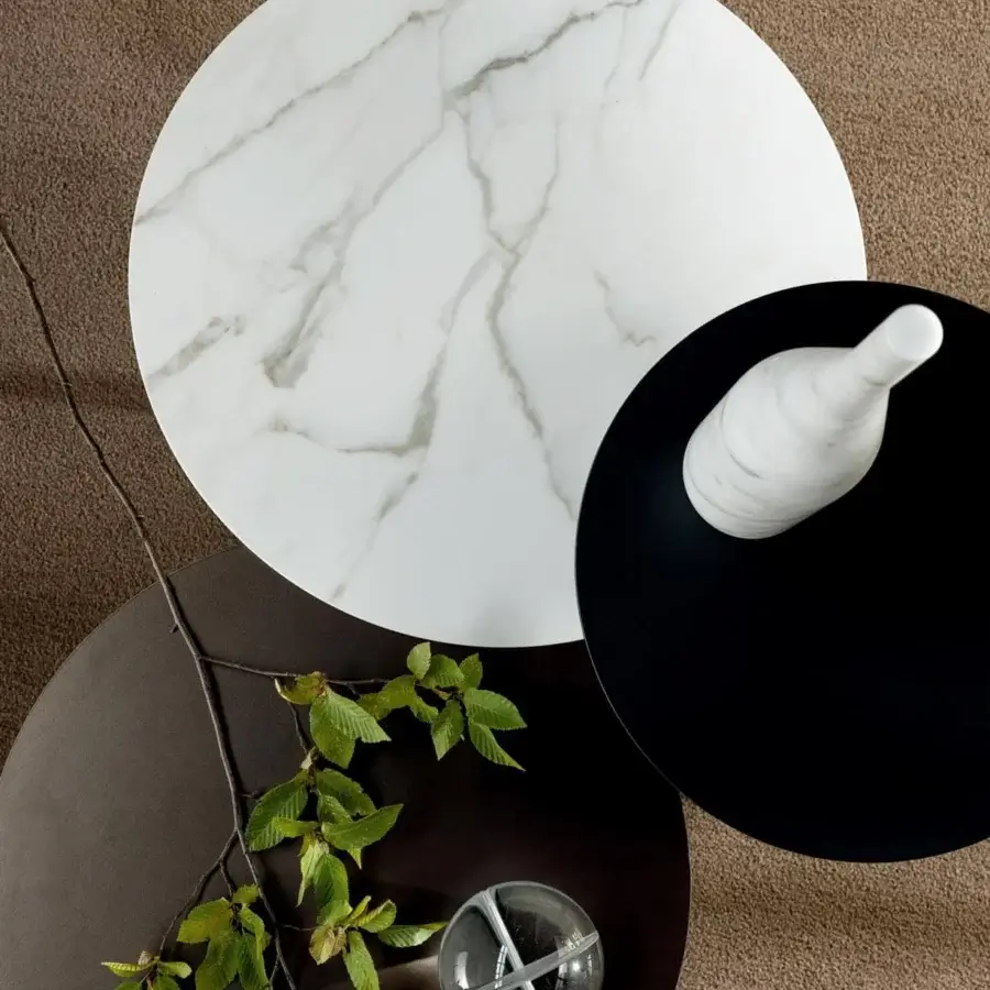 Superior Bonaldo Innesti side table with a round ceramic top and sleek metal base crafted in Italian artistry