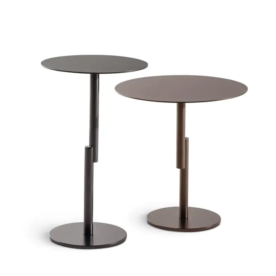 Impeccable Bonaldo Innesti side table with a circular top and bronze metal base in matte finish