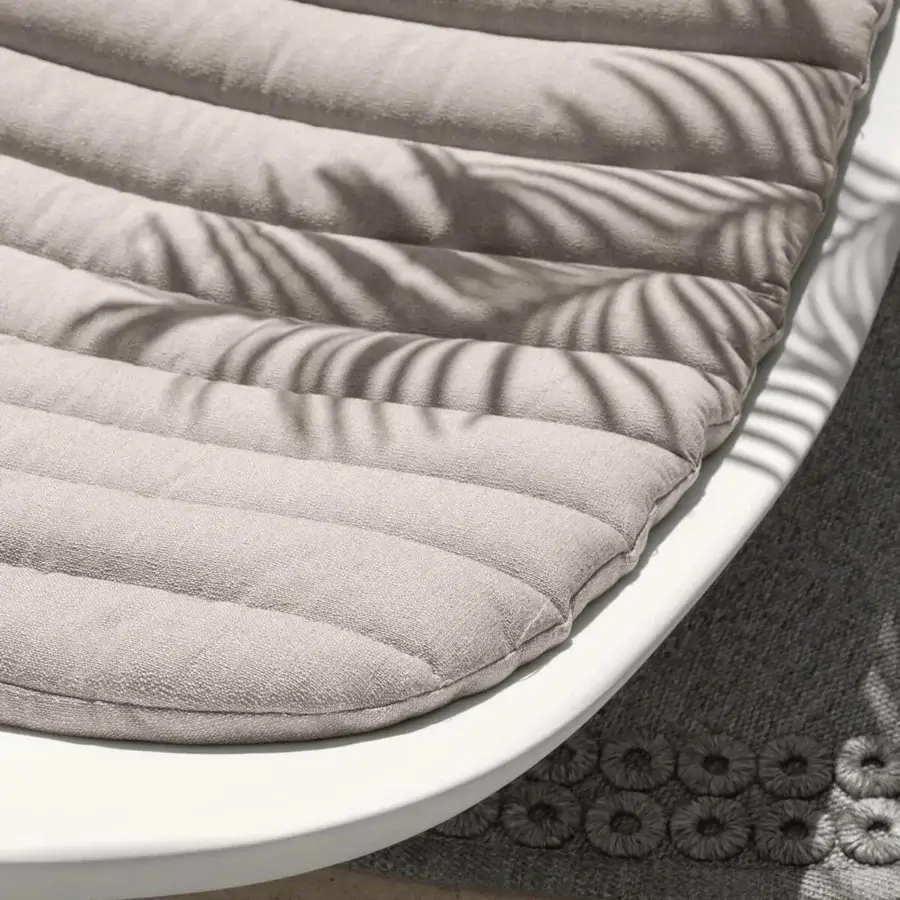 Exceptional Talenti Reef lounger crafted in durable plastic with a neutral cushion and horizontal stitched lines