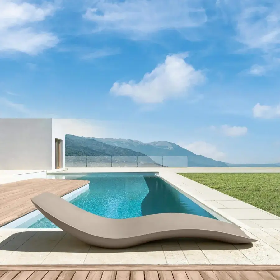 Exceptional Talenti Reef lounger crafted in durable plastic with smooth matte tan finish