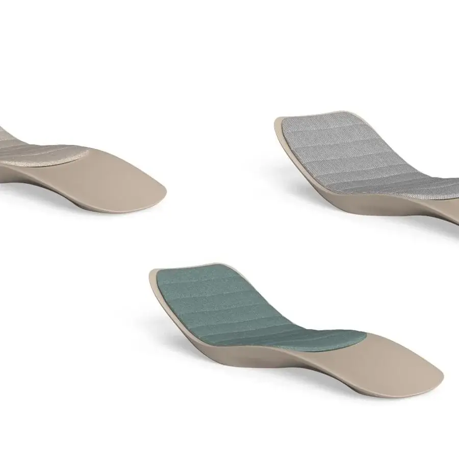 Sophisticated Talenti Reef lounger built in resistant plastic with light beige upholstery and horizontal stitched detailing