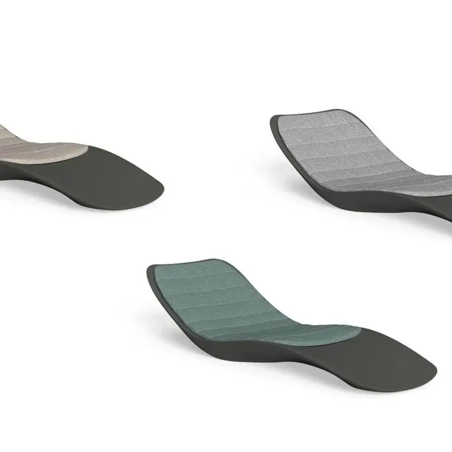 Captivating Talenti Reef lounger crafted in resilient plastic with textured blue-green textile and curved design
