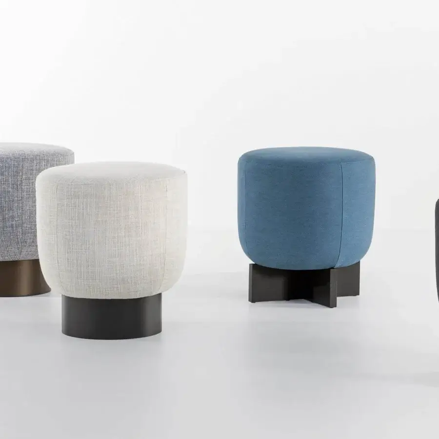 Distinguished Bonaldo Belt & Cross ottoman in medium blue textile with a dark cross-shaped wooden base presents a minimalist Italian design