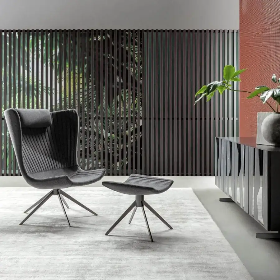 Captivating Bonaldo Colibrì lounge chair with gray textile upholstery and a slender matt painted metal base
