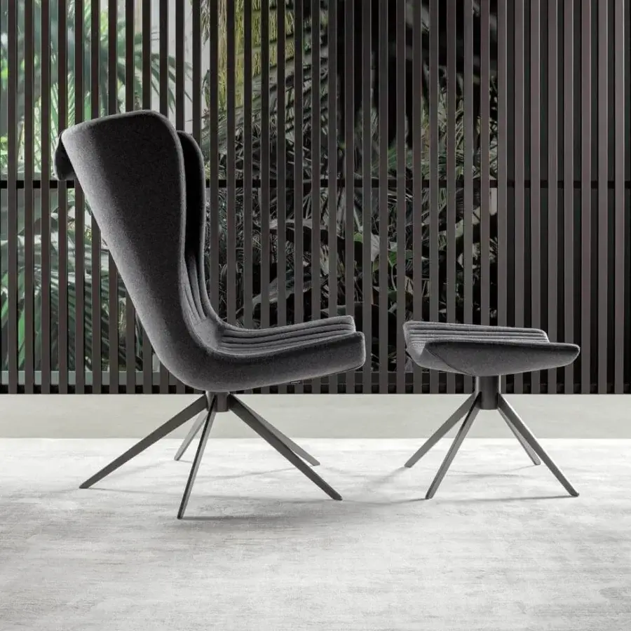 Distinguished Bonaldo Colibrì lounge chair with enveloping backrest upholstered in gray textile and a matt painted metal base