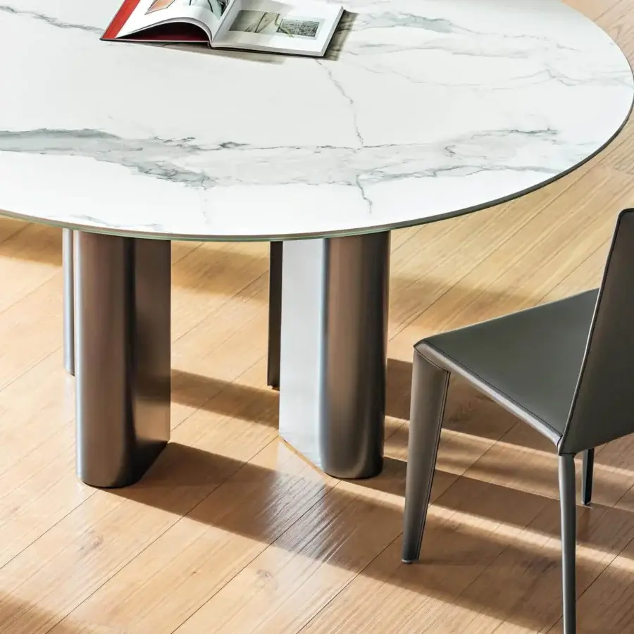 Exceptional Bonaldo Geometric table with a white marble-effect top and dark grey painted aluminum teardrop legs