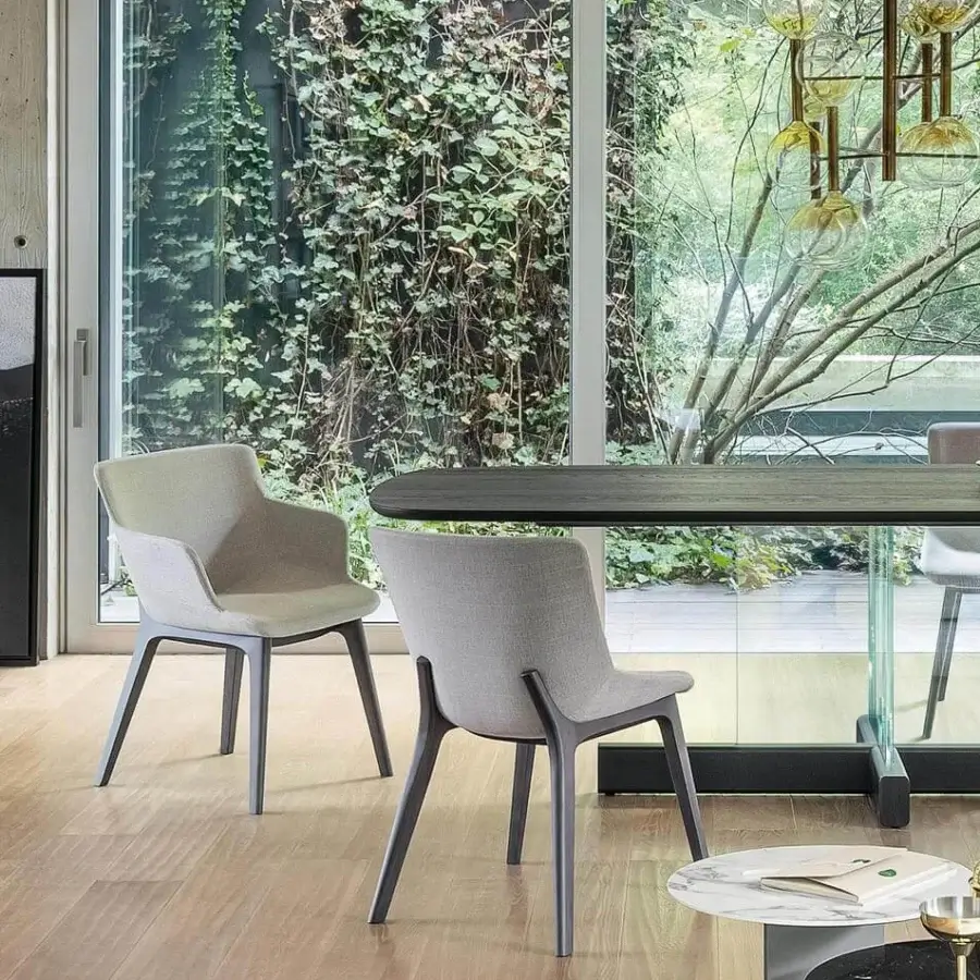 Distinguished Bonaldo Artika Wood chair upholstered in light gray fabric with coal-painted ash wood legs and an opening backrest