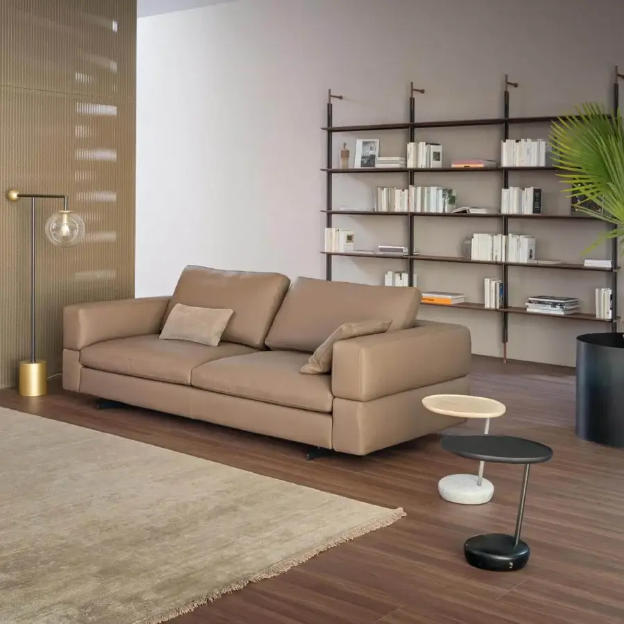 Refined Bonaldo Ever More sofa with smooth light tan leather-like upholstery and embracing backrest design